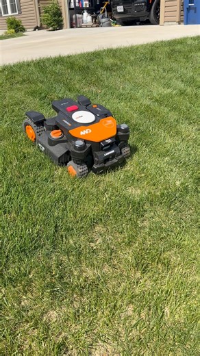 Watch the worx landroid robot lawn mower climb about a 40 degree slope