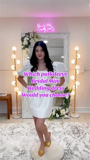 Chic City-Bride Mini For the bride who loves clean lines and bold details these structured puff-sleeve minis are the ultimate downtown wedding vibe. Sleek, confident, and unbelievably flattering. ✨ Minimalist silhouette   statement sleeves = iconic bridal moment. #ModernBride #CityBride #PuffSleeves #ShortWeddingDress #BridalFashion