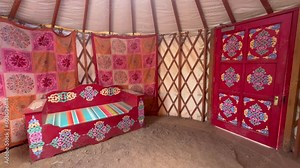 Living room of a a traditional Mongolian yurt ger a portable, round tent traditionally used as a dwelling by nomadic groups in Central Asia Mongolia.