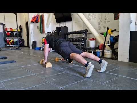 How to do the Parallette Push Up