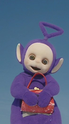 when you’re reunited with the bag you left in the back of the tubby car👛😌 Video: Tinky Winky, the purple Teletubby, hugs his red purse while the rest of the Teletubbies cheer him on. | Teletubbies