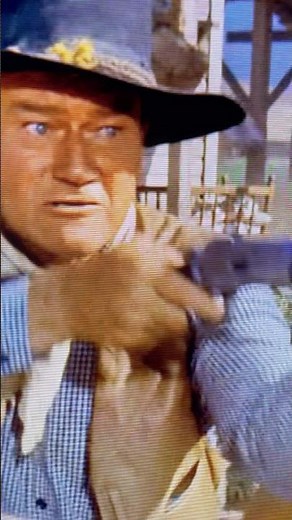 JOHN WAYNE AND SON BATTLE “THE COMANCHEROS.”