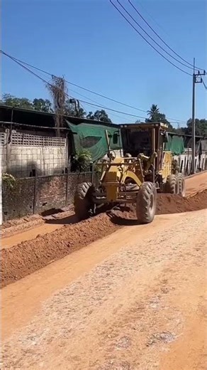 the process of leveling land using special heavy equipment easily