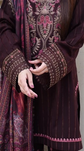 Zarqash on Instagram: "THE WINTER EDIT — LUXE PRÊT ‘25 VELVET EMBER 🤎 VELVET EMBER is a luxurious deep chocolate velvet-karandi winter suit, crafted for women who love elegant festive fashion. The rich velvet canvas is adorned with Kashmiri-inspired embroidery, framing the neckline with sculpted strokes of burnt orange, fuchsia pink, and soft green. The contrast of colour on the dark base creates controlled vibrancy and an artisanal, statement look. Shop the look at: zarqashofficial.com [ winte