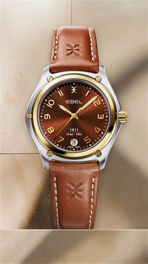 EBEL Watches on Instagram: "Soft Tones, Sharp Focus. EBEL 1911, 34mm in a stainless steel and 18K yellow gold case. Brown galvanic dial with Arabic numerals. Swiss quartz movement. Comes with an additional brown calf strap. Discover it: Link in BIO. #EBEL #EBEL1911 #EBELWatch #SwissMade #SwissWatch #craftsmanship"