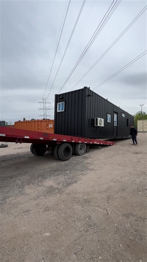 We make it look easy 😎🚛 You don't always need a crane or a forklift so move a container home or office; sometimes just creativity, gumption and a tiltbed. There are a lot of ways to move a container and we've probably tried them all lol Want more container content and tips? Check out our YouTube channel! #containerhome #shippingcontainer #affordablehomes #customhomes #containers #innovative #tinyhome #containerhomes #container #propertydevelopment