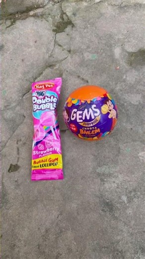 Double bubble gummy lollipop with gems 💎 #shorst #gems #lollipop