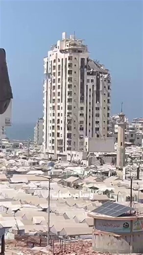 One of the most terrifying attacks carried out by Israel,where it completely destroyed the Mashteha Tower within a matter of seconds, as it is considered one of the largest and most beautiful towers in Gaza, and houses thousands of families living in it,despite the thousands of tents that were located on every side of this tower, aircraft launched no less than 6 deadly missiles that resulted in thousands of lethal shrapnel fragments, which led to the destruction of thousands of tents that were t