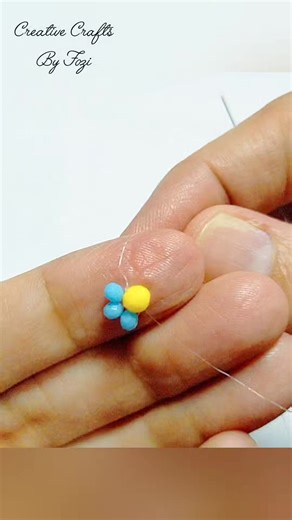 Quick DIY Boho Chic Earrings! ✨ Easy Tutorial #handmadeearrings #jewelrymaking #diycrafts #bohochic #statementearrings #beadedjewelry #DIYBohoEarrings | Creative Crafts By Fozi