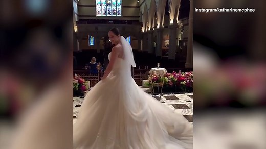 Oh happy day! Katharine McPhee dances in her wedding gown