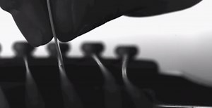 Slow-Motion Camera Captures Guitar Strings in Motion — Video