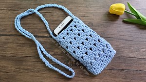 21K views · 166 reactions | Easy DIY crochet phone bag | Step by step for Beginner | Crochet gift idea Bag size: W9 x H16 cm, Strap 100 cm. Cotton milk yarn 5 ply, 60 grams. Crochet hook No.6.0 or 3.5mm. #crochetgifts #crochet #crochetphonebag #crochetphonecase #fblifestyle | Crochet & Crafts Therapy | Facebook