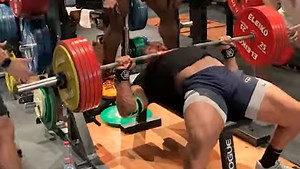 Larry Wheels (140KG) Hits 300-Kilogram (661.4-Pound) Paused Bench Press PR | BarBend