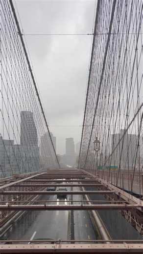 4.1K views · 170 reactions | ️ Rain-soaked Brooklyn Bridge: Where every drop echoes … ☔️ #rainydays #missingyou #brooklynbridge #brooklyn #nyc #nycreels #newyorktraveldiary #raindrops #brooklynny #memories #memoriesforlife | New York Travel Diary | Facebook