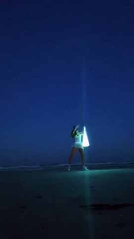 Beach lightsaber spins