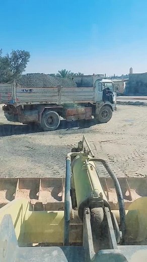 Construction Site Overview with Dump Truck Action