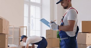 Two Men Movers Relocation Service Checking Stock Footage Video (100% Royalty-free) 3690070999 | Shutterstock