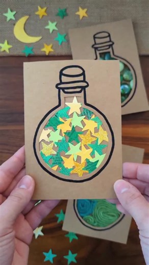 Jen Buchheit on Instagram: "Potion Bottle Collage ✨ Rosie and Mae loved making their own potions with this fun collage craft! I put double sided tape on paper and we filled the page with paper stars, yarn, and flat marbles. Then, we put a cut out of a potion bottle on top, showing all the potion ingredients. #kidcrafts #easycrafts #papercrafts #halloweencrafts"