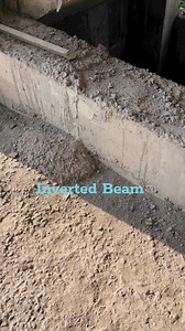 The main reason for using an inverted beam is to **maintain a flat ceiling or floor surface** while still providing structural support. By placing the beam above or within the slab, it helps achieve a smoother aesthetic and maximizes headroom, which is especially useful in areas with height restrictions like basements, parking lots, or spaces requiring unobstructed ceilings. | CivilEngineer