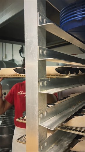 The Final Step of Our Cannoli Making Process: A screen of shells goes into the fryer one at a time, which gives them that golden color and the crunchy taste!! Make sure to follow along for more series like this one #varallobrothersbakery #cannoli #growingupitalian #bakery | Varallo Brothers Bakery