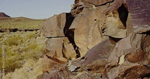 Petroglyphs on the sides of rocks in the Mojave Desert, California
