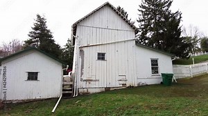 Old white barns on a farm in Ohio