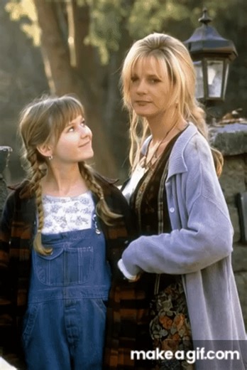 Kirsten Dunst and Bonnie Hunt kissing (AI generated) on Make a GIF