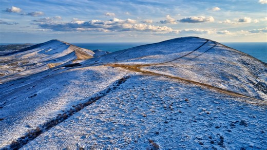 Endless snowy hills stretching to the horizon