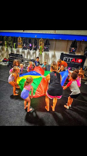 No one can resist the fun of a parachute! | TEN POINT Gymnastics