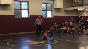Brother mistakes sister's wrestling match for real fight, runs to her rescue