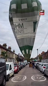 14K views · 85 reactions | A dramatic video shows a hot air balloon making an emergency landing on Bower Street in Bedford, UK, where residents used a tether to help guide it safely between houses, power lines, and parked cars. #ARYStories #ARYNews #UK #hotairballoon #viral | ARY Stories | Facebook