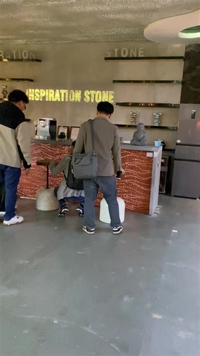 Innovative Reception Desk with Wormhole Cement Board