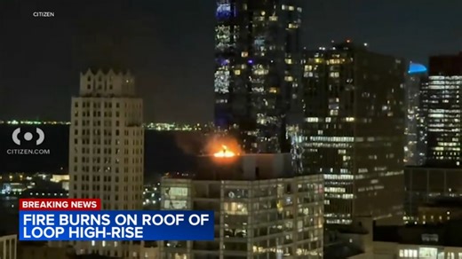 Chicago firefighters battle fire on top of Loop high-rise
