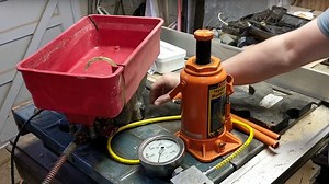 Manual To Hydraulic Press, With A Paint Sprayer