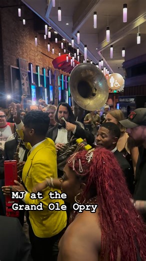 Jon Batiste band plays a classic in the lobby of the Grand Ole Opry | Steven Duffy