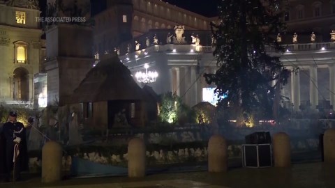 Vatican nativity scene and giant Christmas tree lit up in St Peter's Square ceremony