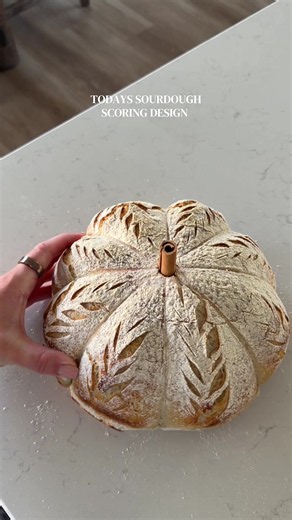A pumpkin sourdough loaf 🧡 #sourdoughbaking #sourdoughscoring #pumpkinloaf #sourdoughtok #breadbaking @knifesagaofficial