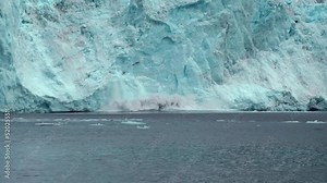 Glacier Ice Collapse into Ocean Water, global warming Massive chunk of ice Falling due to global warming, Alaska, 2022
