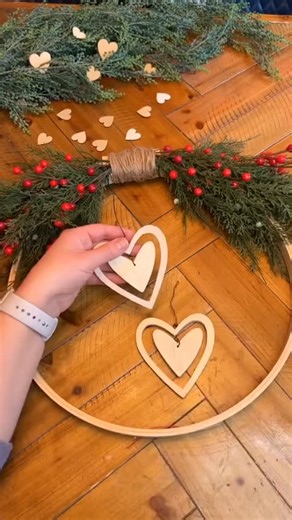@factorydirectcraft on Instagram: "Quick & Simple DIY Valentine’s Day Wreath💕 #valentine #diy #craft #wreath #handmade Valentine wreath, heart wreath, farmhouse Valentine decor, front door wreath, rustic Valentine decor, wooden heart decor, red and white ribbon, berry greenery wreath, modern farmhouse door, Valentine front door, heart door hanger, seasonal wreath, DIY Valentine wreath, neutral Valentine decor, romantic home decor, Valentine entryway decor, farmhouse style wreath, minimalist Val