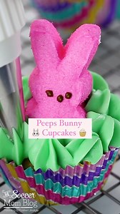 BUNNY PEEPS CUPCAKES 🐰🧁 Oh my cuteness!!! We made a carrot cake cupcakes, scooped out the middle, tucked a little Peeps bunny inside, and surrounded them by cream cheese frosting "grass" -- I can't get over how adorable they turned out! And they're actually pretty easy to make! 🙌 #eastercupcakes #peepsbunny #easterdesserts #cupcakes | The Soccer Mom Blog - Positive Inspiration for Moms