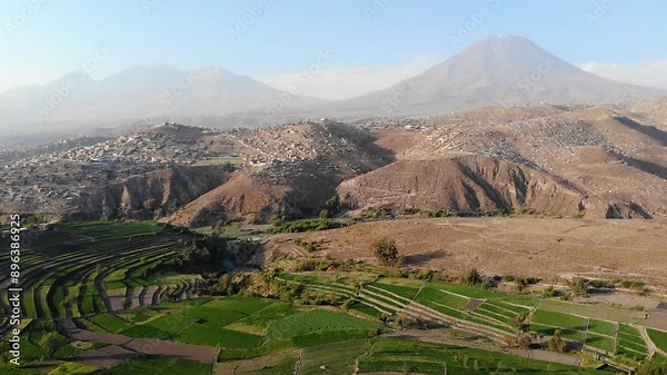 Aerial view of the terraces and platforms of Yumina in Arequipa Peru with the Misti and Chachani volcanoes