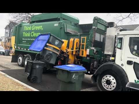 Waste Management Garbage Truck Packing Out On Recycling