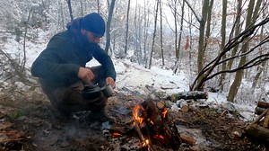 278K views · 10K reactions | Me and my dog agir are winter camping in a snow storm. I made a quick survival shelter and bushcraft bed to stay dry and warm. In this 3 days camp I cook very delicious meals. Since it is very cold at night, I sleep little and spend the night by the fire so sometimesI sleep during the day. It was a 3 day wilderness camp full of adventure. Enjoy it. | Wargeh Bushcraft | Facebook