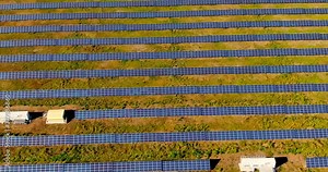 Aerial view, rows of solar panels, solar station with modern equipment. Innovative solar energy processing technologies. 4k, ProRes