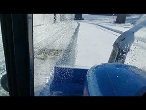 LS Tractor MT340 with 74 inch front mount snow blower.