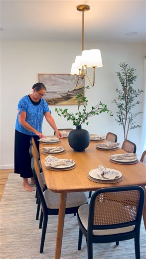 Lynette Yoder on Instagram: "Dining Room Tour! My parents’ home was destroyed in #stormdebby2024. They lost almost everything. So I was thrilled to partner with @castleryus to give them New Dining Room furniture for their ‘new to them’ home! (Which is beautiful). This is the Vincent Oak Table in the 86’ in length, paired with the Edith cane dining chair. They also chose the Edith counter stools to put at the island! @castleryus is a wonderful place to shop for modern, timeless furniture! . . #ca