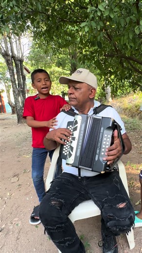 Los compadres versando