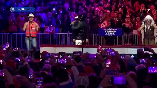 Watch Village People perform YMCA as Trump dances along