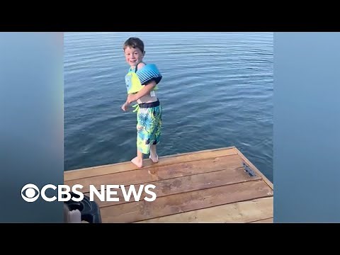 Boy finds the courage to jump off dock into Alaska lake