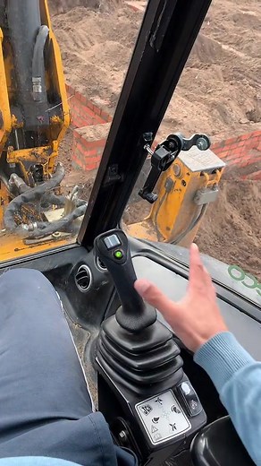 Backhoe Loader Operation at Construction Site